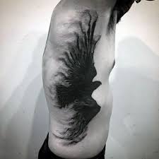 Top 111 Raven Tattoo Ideas 2020 Inspiration Guide Raven Tattoo Tattoo Designs Men Mens Side Tattoos