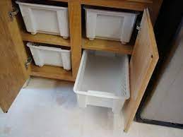 Under cabinet storage like hanging wine glass racks set stemware upside down to make use of vertical space and keep dust out. Cost Effective Kitchen Storage For Deep Cabinets No More Crawling To The Back And Reaching Blindly Kitchen Cabinet Organization No Pantry Solutions Storage