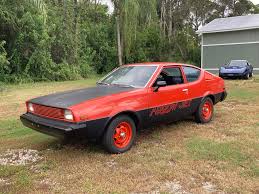 Image result for Spitfire Orange 1978 Colt