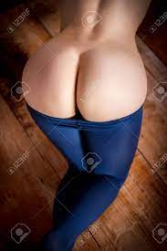 Beautiful Naked Buttocks Of A Woman In Blue Leggings Stock Photo, Picture  And Royalty Free Image. Image 71012959.