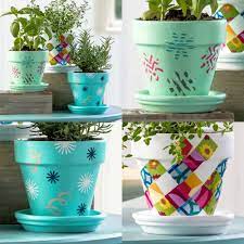 Decorating with the earthy, warm shade of terracotta. Flower Pot Decoration Ideas Three Unique Mod Podge Rocks