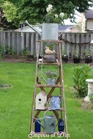 12 Creative And Rustic Garden Art Ladder Ideas Empress Of Dirt Rustic Garden Decor Old Wood Ladder Garden Crafts Diy