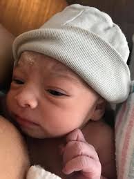 Meet our little Raelyn Sage Lopez:) She is gorgeous! Of course parents  always say that:) I think she looks like Knightly! P.S I'm holding her  here! And mamma Tea is doing great!!