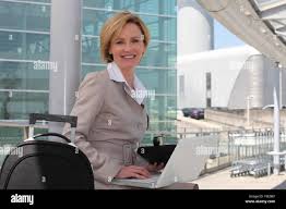 Woman at work at airport hi-res stock photography and images - Alamy