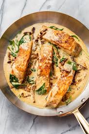 Spinach Sun Dried Tomatoes Garlic Basil And Cream Combine To Make The Best Sauce For Pan Seared Salmon It S Ea Tuscan Salmon Recipe Salmon Recipes Recipes