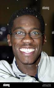 Sprinter Christian Malcolm in London for the unveiling of the new Asics Gel  Kayano training shoe and the announcement of Asics' sponsorship deal with  him Stock Photo