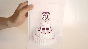 Next, put the end of one of your cake sides onto a taped support and press down hard. How To Make A Pop Up Wedding Cake Card Cake Walls
