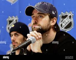 Buffalo Sabres' Chris Drury, right and Ryan Miller, left, answer questions  during a news conference in Buffalo, N.Y., Wednesday, May 9, 2007. The  Sabres will play the Ottawa Senators in Game 1