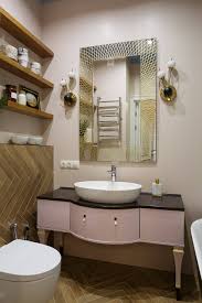 The huge oval mirrors add. 75 Beautiful Brown Tile Bathroom With Pink Walls Pictures Ideas December 2020 Houzz