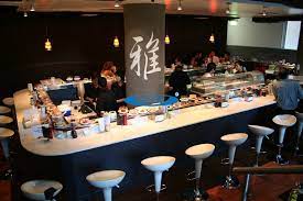 Its swivel stools allow you to rotate and bar stools & tables are taller and occupy a very smaller space. What Do You Call The Table Counter Surrounding A Sushi Conveyor Belt English Language Learners Stack Exchange