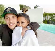 Grande and her fiancé dalton gomez, a real estate agent, got married over the weekend, tmz <almost exactly a year after making their relationship public, ariana grande and dalton gomez have. Inside Ariana Grande And Dalton Gomez S Serious Relationship