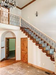 A handrail is required for 4 or more risers (3 treads). How We Completely Updated Our Stair Railings By Only Swapping Out The Balusters Chris Loves Julia