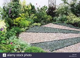 How to create attractive diy backyard walkways with easy to find materials such as gravel, brick, stepping stones, wood, pavers. White Gravel Garden Design Windowsunity