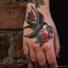 30 Astonishing Sparrow Tattoo Designs Tats N Rings Traditional Tattoo Traditional Hand Tattoo Bird Tattoos For Women