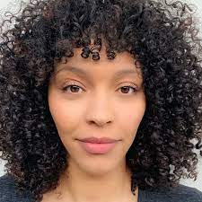 Here's how to cut bangs for curly hair. How To Cut And Style Curly Bangs According To A Stylist Naturallycurly Com