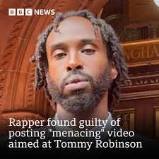 The rapper, named Twista Cheese, made a gun gesture in a video aimed at the  former English Defence League leader Stephen Yaxley-Lennon, also known as  Tommy Robinson. Full story: https://bbc.in/4jaHUYP