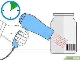 Scrubbing sticky labels with steel wool eliminates a majority of the sticker. 6 Ways To Remove A Sticker From Glass Wikihow Life
