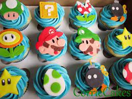 Couldn't find a store that made mario cupcakes, so we just had the cupcakes made, and added the. Corriecakes Corriecakes S Photos Facebook Super Mario Cupcakes Super Mario Cake Mario Birthday Cake