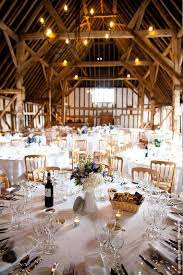Clock Barn Is An Impressive Barn Wedding Venue Between Newbury And Winchester Rural Hampshire Barn Wedding Venue Barn Wedding Wedding Table Settings