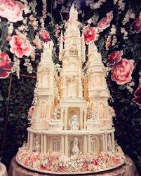14 Extravagant Wedding Cake Designs For 2018 Weddings Extravagant Wedding Extravagant Wedding Cakes Castle Wedding Cake