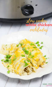 These easy chicken enchiladas make the best mexican dinner ever! Slow Cooker Green Chicken Enchiladas With Video Sugar Spice And Glitter