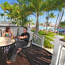 Each florida keys accommodation features classic caribbean décor, complimentary internet access and upscale amenities. Water View Lanai Guestroom Happy Couple At A Poolside Guestroom In A Florida Keys Hotel Florida Keys Resorts Florida Keys Hotels Hawks Cay Resort