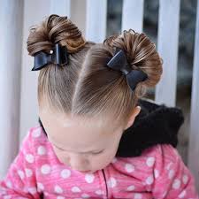 In this bun, braids are created at both ends of the head after middle parting the hair. 65 Cute Little Girl Hairstyles 2021 Guide