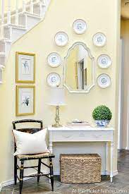 Yellow is also the most fatiguing to the eye due to the high amount of light that is reflected.using yellow as a background on paper or computer monitors can lead to eyestrain. Staircase And Entry Makeover Reveal At The Picket Fence Yellow Walls Living Room Yellow Living Room Yellow Dining Room