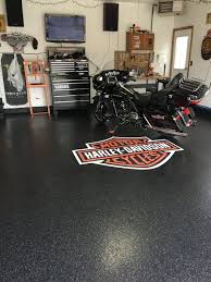 Man Cave Garage Flooring With Harley Davidson Logo Contact Us For A Quote In The Ocean City Maryland Area Garage Epoxy Garage Floor Epoxy Garage Floor