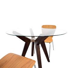 Wood dining room table with four chairs. 74 Off Crate Barrel Crate Barrel Strut Round Dining Table Set Tables