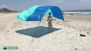 Shade sails are in general a great thing and are probably more useful than awnings or gazebos, but carport canopy backyard carport carport shade patios beach bungalow exterior pergola house. Shibumi Shade Set Up World S Best Beach Shade Youtube