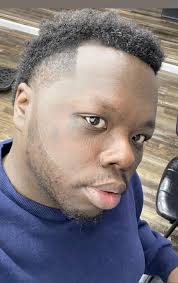 Michael Yeargin first time in my life seeing a African with Down syndrome  with a jerry curl relaxer 😩😩😩😩😩😩bombbooooclaaatttt