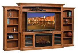 The fireplace can support up to 100 pounds, making it a terrific tv stand, and there are adjustable. Buckingham Entertainment Center With Electric Fireplace From