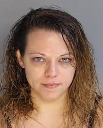 North Augusta woman charged in drive-by shooting, male suspect sought