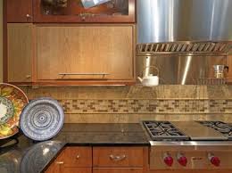 But it's also a blank canvas just waiting for your personal stamp. Thinking About Backsplash Design Our Colors Will Be A Creamy Gray Stone Tile With Small Square Glass Tiles But This Style May Look Nice Cocinas Hogar Casas