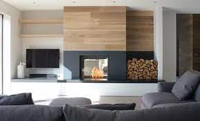Mike chajecki / pizzale design inc. This Beautiful Home In Rock Uses It S Stuv Double Sided Fire To Heat Both The Large Lounge And Dining Room See This And Ocak Ev Ic Mekanlari Ev Oturma Odasi