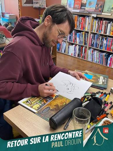RETOUR SUR LA RENCONTRE DESSINÉE 🙏 Mille mercis à Paul Drouin d'avoir passé l'après midi avec nous samedi dernier, en venant à la rencontre des lectrices et lecteurs pour ses séries «