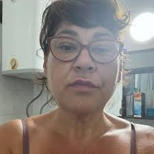 Little girl dresses up as a flower to meet hummingbirds