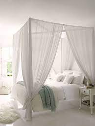 Stunning bedrooms flaunting decorative canopy beds. Walking In A Winter Wonderland Myhome Blog White Bed Canopy White Rooms White Canopy Bed