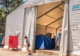 What companies run services between athens, greece and malakasa, greece? Mothers And Babies Lack Basic Needs In Greek Refugee Camps