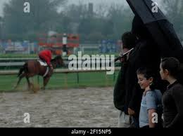 Tammy Fox rides Little Nick past trainer Dale Romans, Gene Simmons, Jacob  Romans, 11, and Bailey Romans, 14, (left-right) for the upcoming 133rd  Kentucky Derby in Louisville, Kentucky, Thursday, May 3, 2007. (