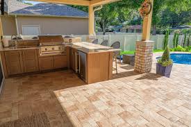 Quartzite countertops in your outdoor kitchen are a crowd favorite, especially if you like the look of usually poured during installation, concrete counters are a durable choice for many homeowners. Custom L Shaped Outdoor Kitchen And Cabinets In Tampa Just Grillin Outdoor Living