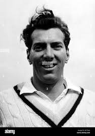 Cricket batsman black Black and White Stock Photos & Images