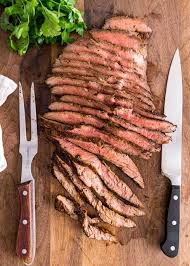 The trick to a good flank steak, or any steak, is marinade. Marinated Grilled Flank Steak Kevin Is Cooking