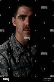 U.S. Air Force Capt. Aaron Blackburn, 20th Force Support Squadron manpower  officer, sits for a photo at Shaw Air Force Base, S.C., March 15, 2017.  Blackburn participated in Mustache March, an Air