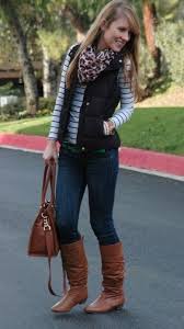 Woman Black Jeans And Brown Boots Jeans Brown Boots Striped Shirt Quilted Puffer Vest Scarf Fashion Comfortable Outfits Black Vest Outfit