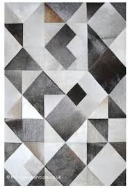 Geometric carpet rug for living room | black/grey modern art printed rectangle floor rugs carpet for parlour mat bedroom washable home the most common large grey carpet material is wool. Zaro Grey Rug A Luxury Handmade Cream Grey Beige Cowhide Leather Rug With A Geometric Pattern Http Www Therug Leather Rug Cowhide Leather Rug Rug Texture