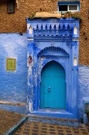 Typical, old, brown intricately carved, studded, moroccan riad door. Enchanting Chefchaouen Morocco S Blue City Is A Must See Travel Gem Planet Janet Travels