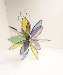 Stained glass suncatcher, rainbow star, multi colour garden art, outdoor decoration, hanging wall décor panel, birthday gifts for teachers crhodesglassart from shop crhodesglassart Pin On Hang It