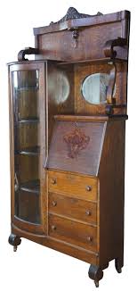 This piece features a mountable hutch with a fold down desktop perfect for writing and drawing. National Furniture Antique Side By Side Secretary Desk And Curved Glass Bookcase At 1stdibs